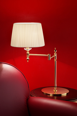 Golden articulated table lamp. Masiero. 