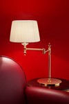 Golden articulated table lamp. Masiero. 