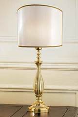 Large gold-plated bronze table lamp with pale-beige shade. Masiero. Large gold-plated bronze table lamp with pale-beige shade. Masiero.