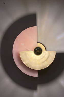 Levante adjustable wall sconce in brushed brass and pink onyx. Matlight. 