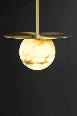 Moons round pendant in marble and satin brass. Matlight. 