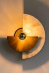 Levante wall lamp sundial in bronze and alabaster. Matlight. 