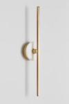 Minimalist wall lamp in brass and white marble. Matlight. 