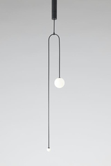Long black patinated brass pendant with two white globes of different size Mobile Chandelier 7. Michael Anastassiades. 