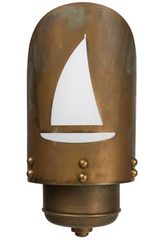 Exterior wall light in aged brass with laser cut boat. Moretti Luce. Exterior wall light in aged brass with laser cut boat. Moretti Luce.
