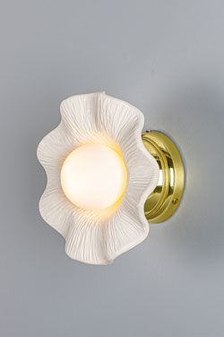 Wavy and grooved ceramic round wall light Rivale. Mullan. 