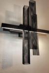 Metropolis matt black metal mesh wall light. Myo. 
