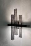 Metropolis matt black metal mesh wall light. Myo. 