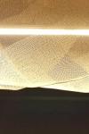 Large Aura pendant light in gold-plated steel mesh. Myo. 