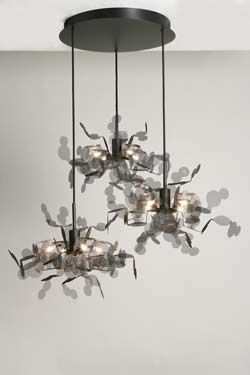 Unfocused triple pendant in black steel mesh. Myo. 