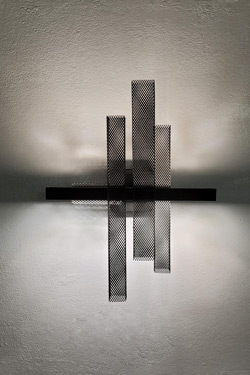 Metropolis matt black metal mesh wall light. Myo. 