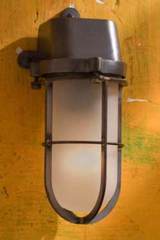 Admiral wall light in antique bronze and sand-blasted glass. Nautic by Tekna. 