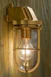 Admiral wall light in polished bronze with clear glass. Nautic by Tekna. 