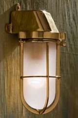 Admiral wall light in polished bronze with sand-blasted glass. Nautic by Tekna. 