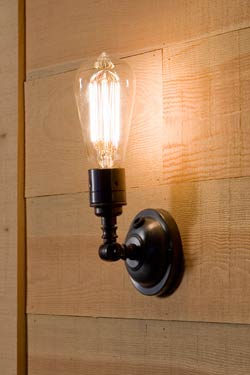 Thorne Pete antique bronze wall light. Nautic by Tekna. 