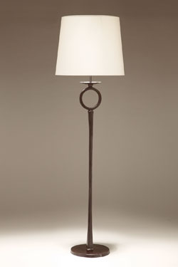 Floor lamp in solid bronze, ring on the foot Diego. Objet insolite. 