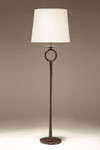 Floor lamp in solid bronze, ring on the foot Diego. Objet insolite. 