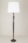 Jude contemporary floor lamp in black patina bronze. Objet insolite. 