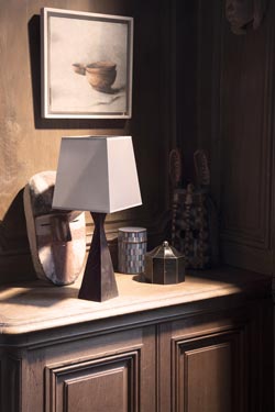 Pablo small table lamp with hourglass shape base and black patinated bronze finish. Objet insolite. 