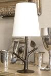 Folia small country-style table lamp in patinated bronze. Objet insolite. 