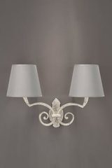 Sully applique 2 lumières en bronze finition nickel satiné. Objet insolite. Sully applique 2 lumières en bronze finition nickel satiné. Objet insolite.