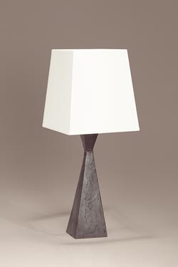 Pablo small table lamp with hourglass shape base and black patinated bronze finish. Objet insolite. 