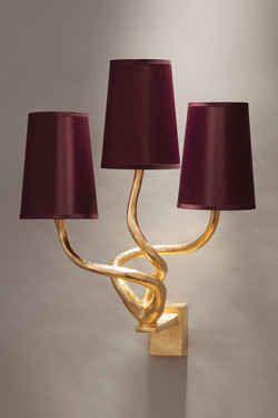 Triple gilded solid bronze wall lamp and 3 burgundy color shades. Objet insolite. 