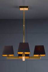 Prisma Ouro suspension 4 abat-jour en croix. Paulo Coelho. Prisma Ouro suspension 4 abat-jour en croix. Paulo Coelho.