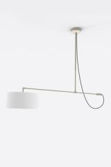 Raisa offset pendant light in matte white metal. Robin. 