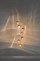 Mizu suspension 7 gouttes de cristal champagne. Terzani. Mizu suspension 7 gouttes de cristal champagne. Terzani.