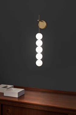 Abacus sconce with 5 white and satin brass balls. Terzani. 