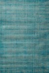 Tapis de salon Voyage turquoise 200x300cm. Toulemonde Bochart. 