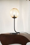 Lampe de table noire et ambrée Puppet. Vistosi. 