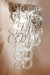 Giogali AP NV wall lamp in clear glass links. Vistosi. 