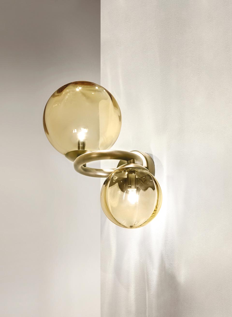 Puppet wall lamp 2 amber spheres. Vistosi. 
